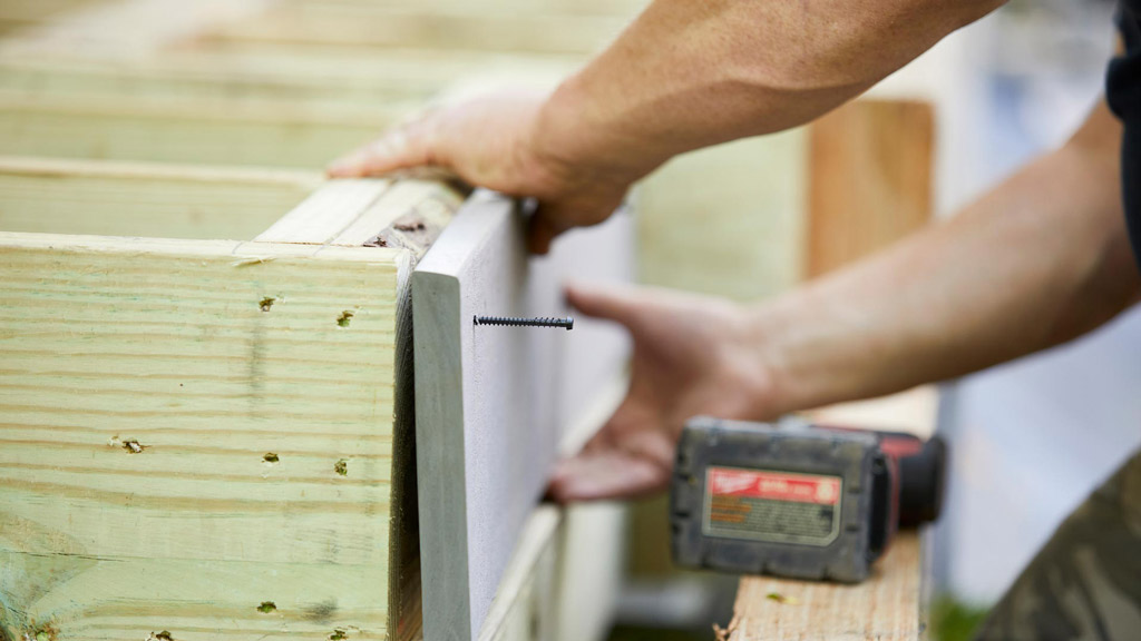 Deck builder putting screw's