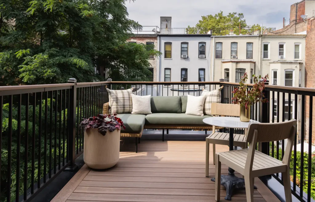 White building and open space with a brown deck